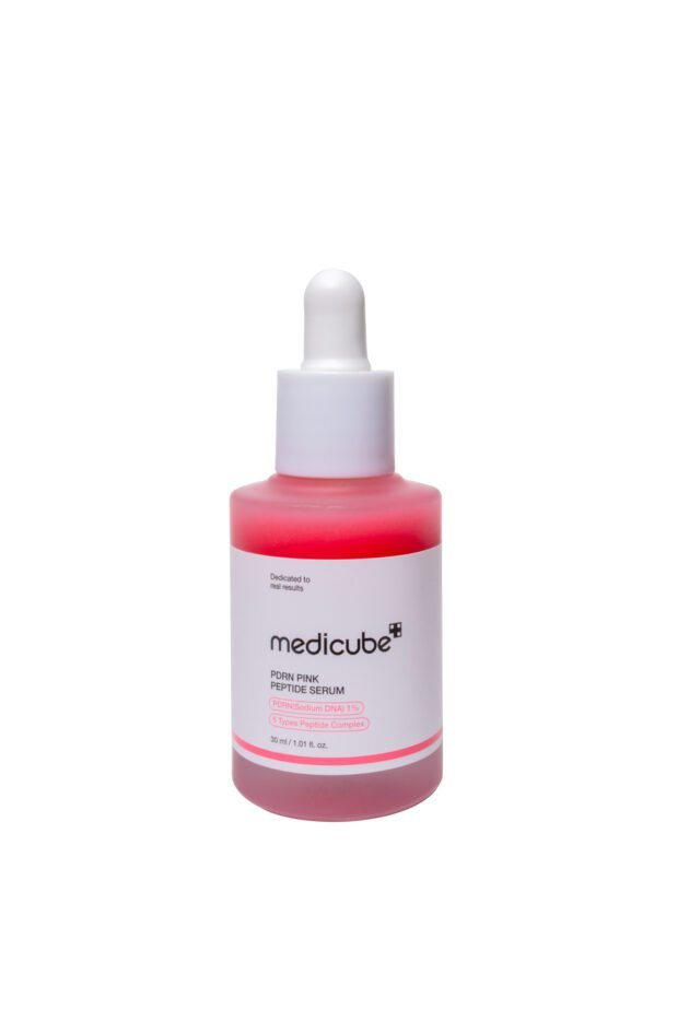 Bottle of Medicube Salmon PDRN Serum with dropper, placed on a clean surface with a minimal background.