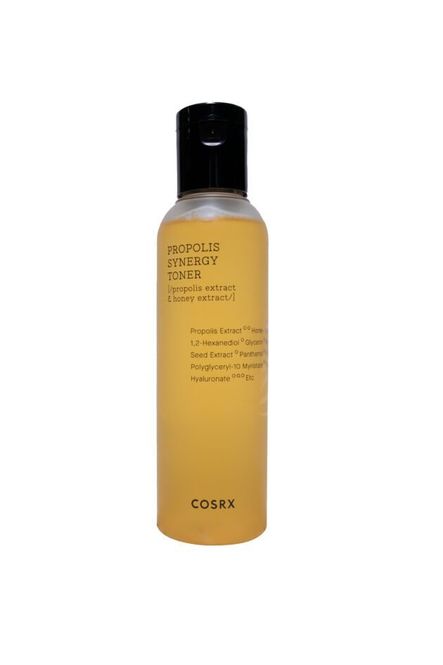 Bottle of COSRX Full Fit Propolis Synergy Toner with a sleek design, featuring a golden hue and minimalistic label with Korean text. Ideal for hydrating and soothing skin.