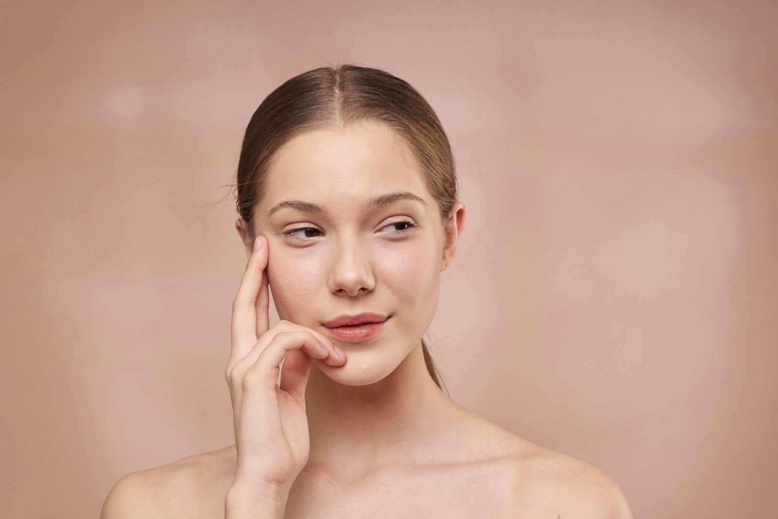 Applying gel cleanser during skincare routine, showing what is a gel cleanser.