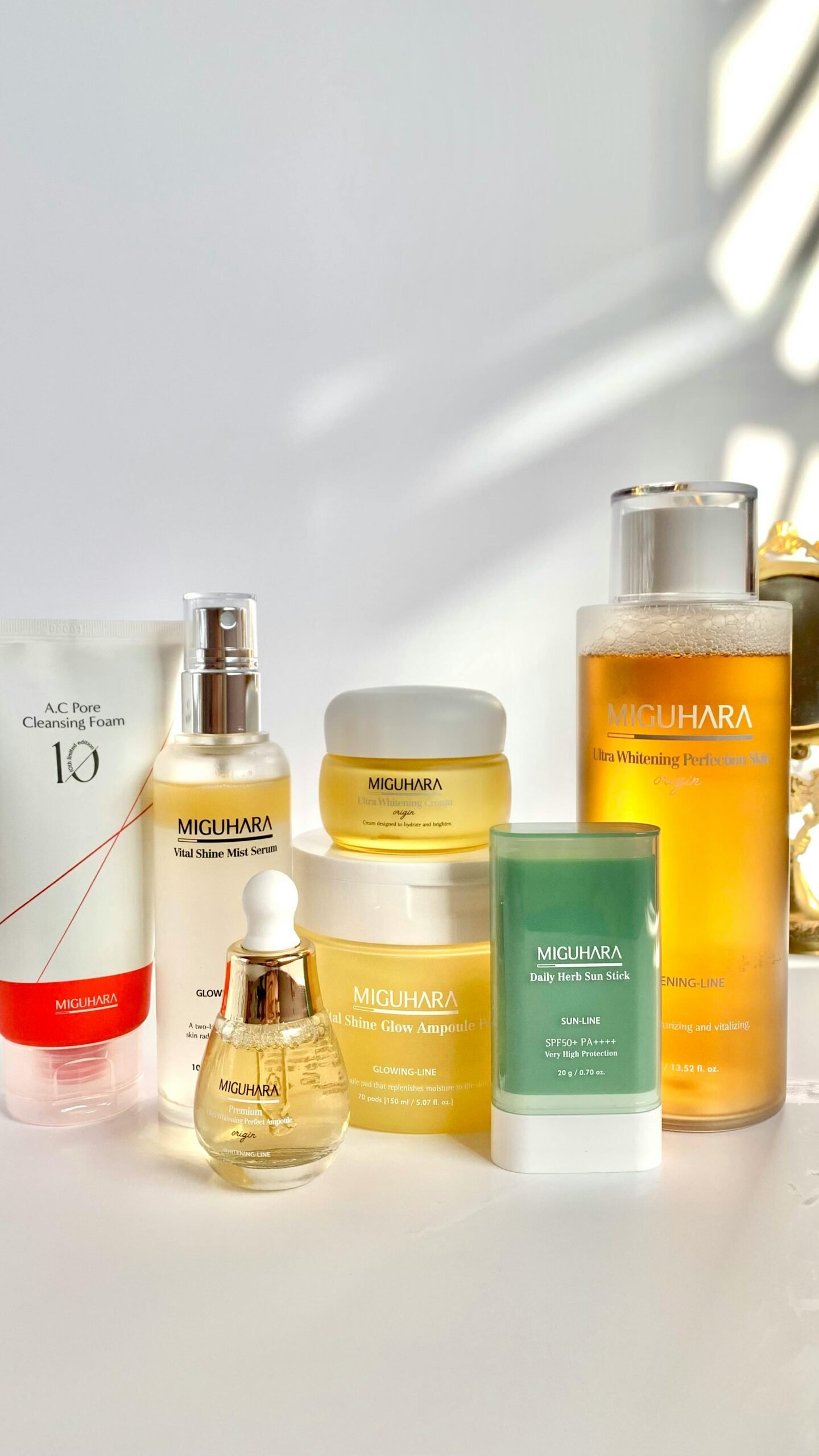 A visual comparison of skincare products – serum vs toner – displayed in minimalist bottles on a clean surface.